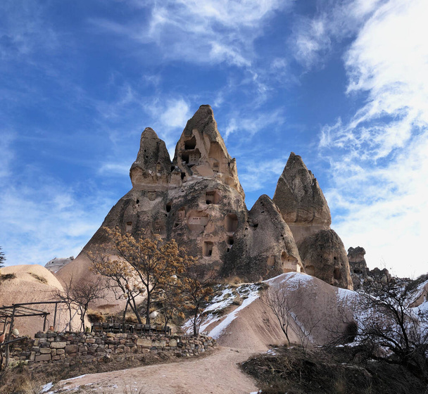 Ancient dwellings hollowed out in volcanic rock. Cappadocia, Turkey. - Fotó, kép
