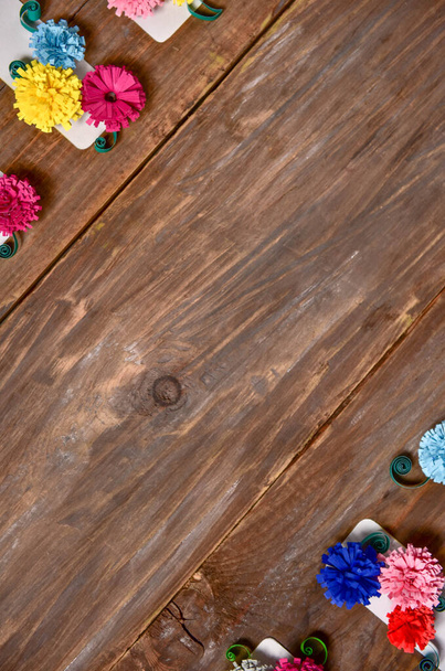 multicolored flowers on a wooden background. - Photo, Image