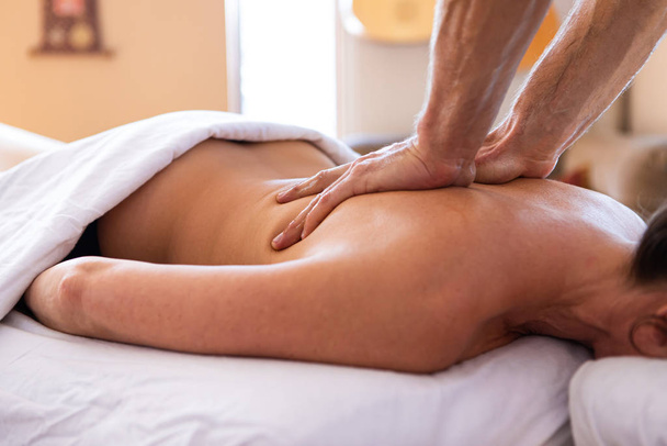 Woman getting relaxing massage - Фото, изображение