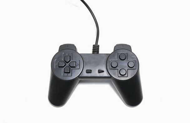 Black game controller isolated on white background. - Photo, Image