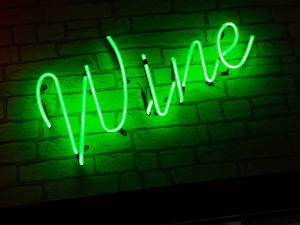 Wine Neon Letters Sign In beverage Department store in Market. - Photo, Image