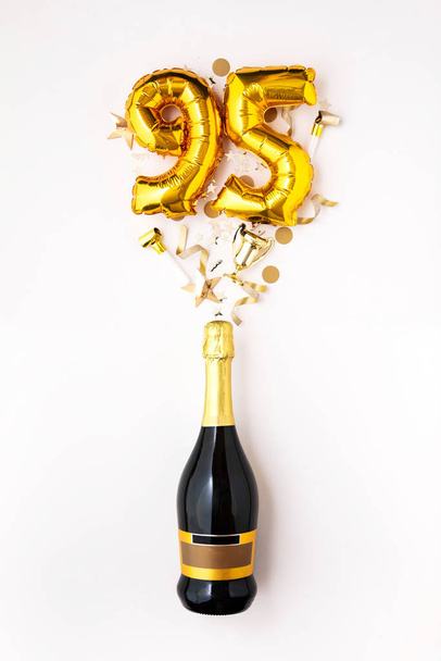 Happy 95th anniversary party. Champagne bottle with gold number balloon. - Фото, зображення