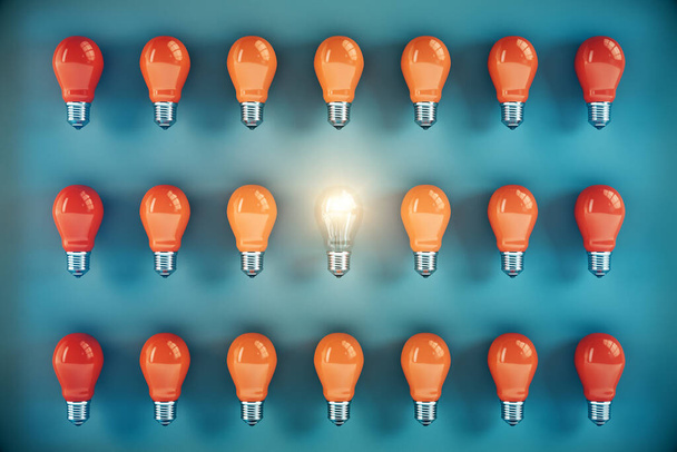 Many orange light bulbs in a row and one glows on blue background. Success and startup concept. 3D Rendering - Photo, Image