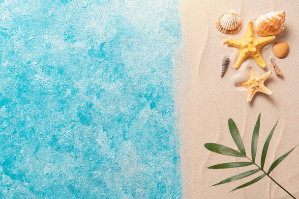 Minimal exotic concept. Creative layout of sand waves and sea, summer beach background with shell, sea star, and blurred Palm vacation and travel concept, Flat lay top view copy space - 写真・画像
