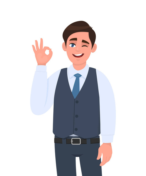 Young businessman in waistcoat showing okay or OK gesture and winking eye. Person making symbol of good or cool sign. Male character design illustration. Human emotions concept in vector cartoon. - Vector, Image