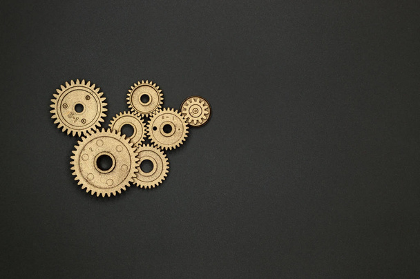 Template of golden plastic gears for industry projects or mechanics topics. - 写真・画像