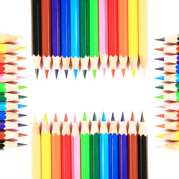 Кольорові олівці на білому тлі
 - Фото, зображення