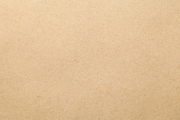 Sea sand background. Hot summer texture. Flat lay. Top view - Zdjęcie, obraz