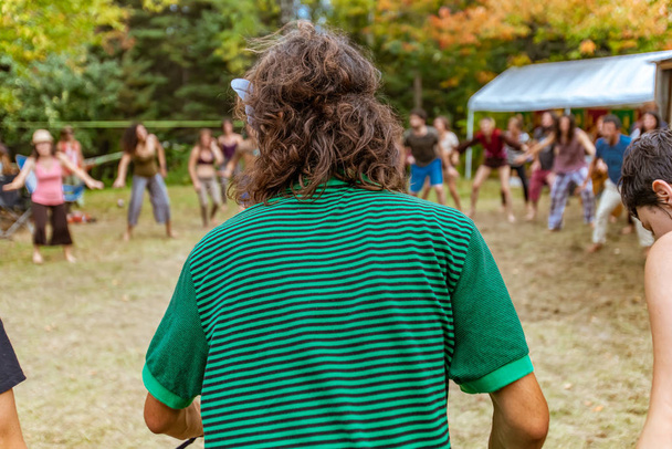 Diverse people dance at earth festival - Photo, Image