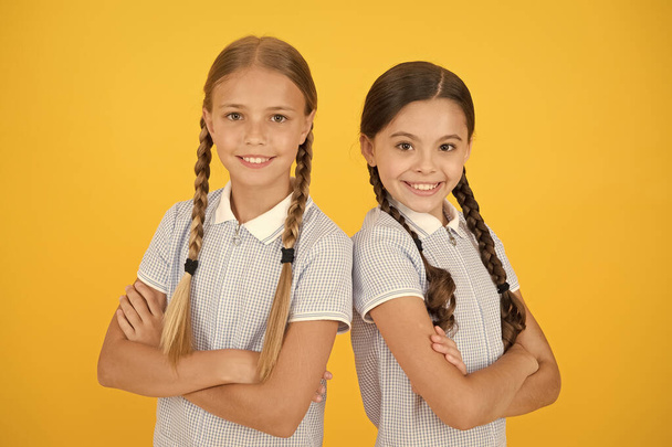 Girls happy faces. Difference between childrens and youth rights. International childrens day. Field of childrens rights spans fields of law politics religion and morality. Kids sisters friends - Φωτογραφία, εικόνα