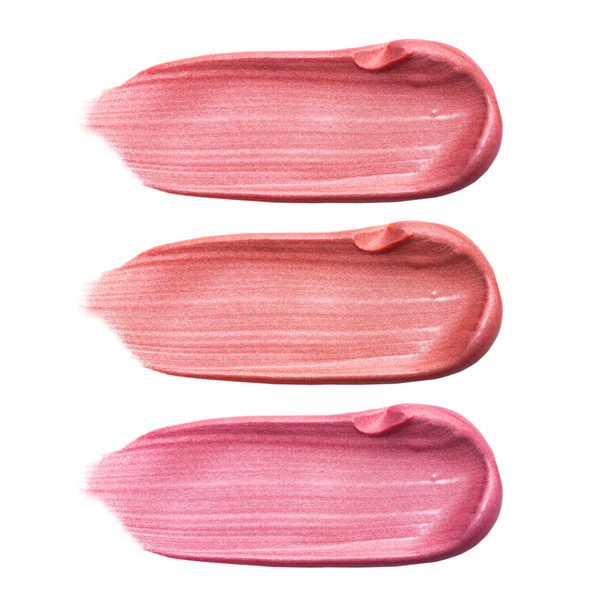Set van verschillende kleuren lip glossen uitstrijkje geïsoleerd op wit. Vlekkerig make-up product monster - Foto, afbeelding