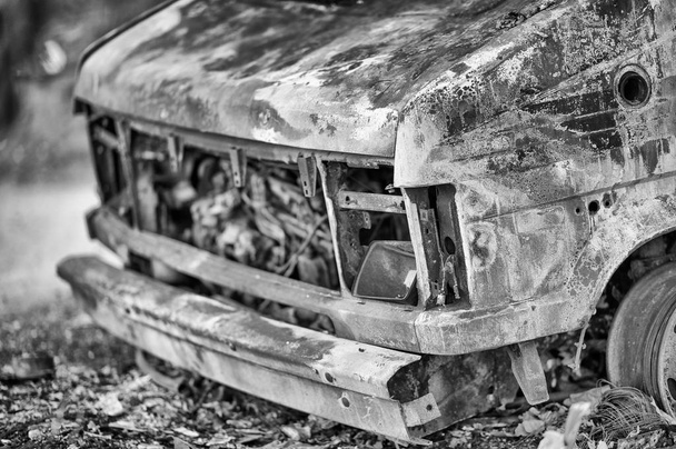 Car wreckage. Rusty car body, abandoned vehicle. - Photo, Image