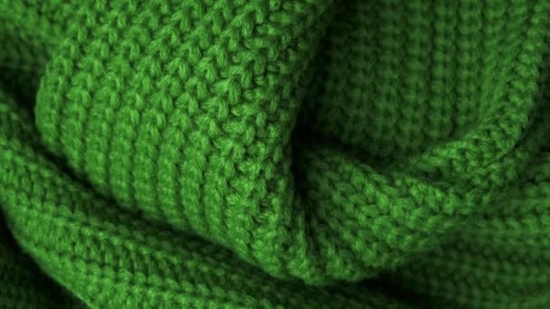 La texture del tessuto. Struttura lavorata a maglia verde. Primo piano. Può essere utilizzato come sfondo
. - Filmati, video