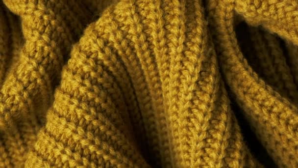 Gelbe Wolle Textur abstrakten Hintergrund. Ansicht von oben - Filmmaterial, Video