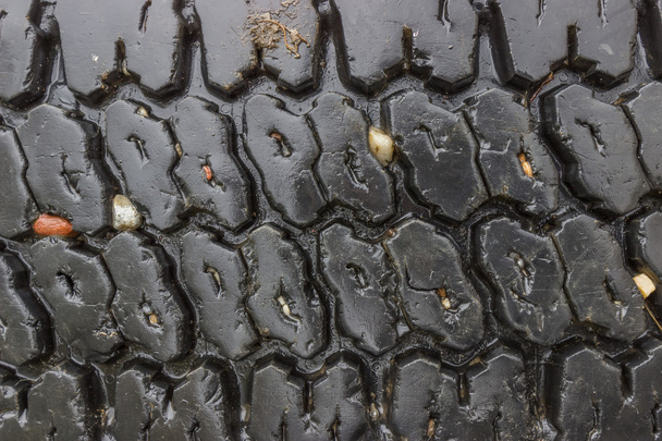 Wet worn tire of the truck background 4 - Photo, Image