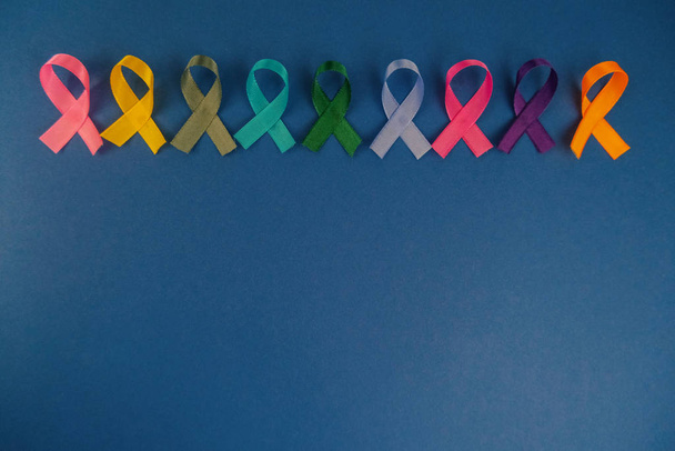 Different ribbons, symbols of cancer, cancer awareness month.  Copy space for your text.  - Foto, afbeelding