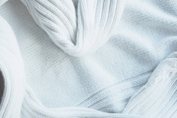 Fundo e textura de uma jaqueta de lã de malha branca
 - Foto, Imagem