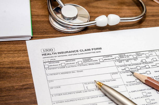 health insurance claim form and stethoscope - Photo, Image