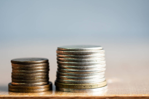Close up group of coins on blurred background in business concept. - Φωτογραφία, εικόνα