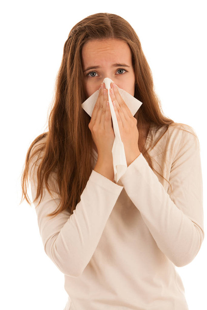 Upset young woman suffering from influenza at hom - Foto, Bild
