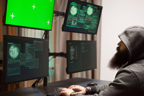 Bearded man hacking his government servers - Photo, Image