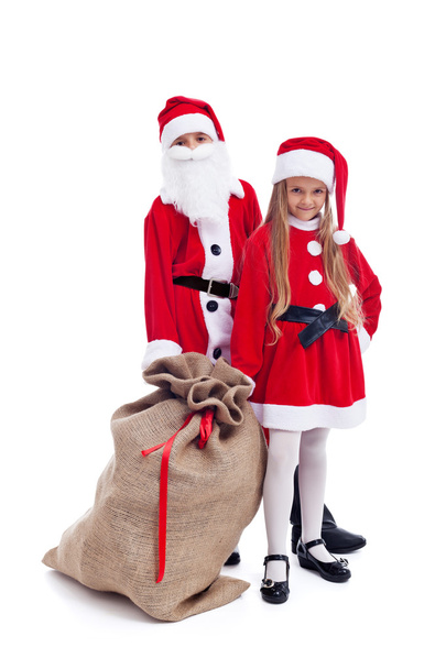 Santa and helper ready for the christmas action - Фото, зображення