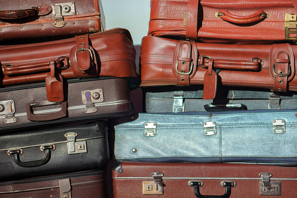 Pile of colorful vintage suitcases. - Foto, imagen