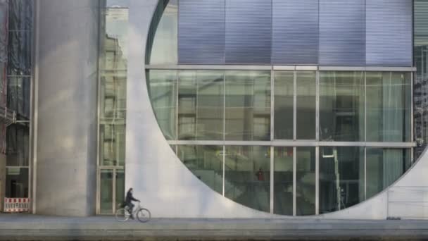 People passing by Marie Elisabeth Lueders Haus building window cricle architecture detail - Video