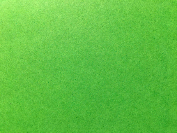 licht groen papier pagina textuur achtergrond voor ontwerp. Bovenaanzicht - Foto, afbeelding