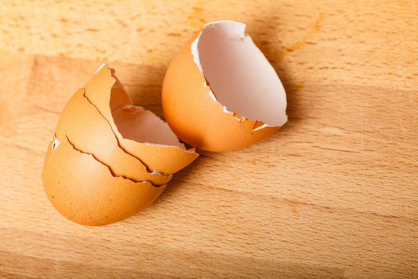 Kitchen food products details concept. Detailed closeup of empty cracked eggshells left after cooking. - Foto, immagini