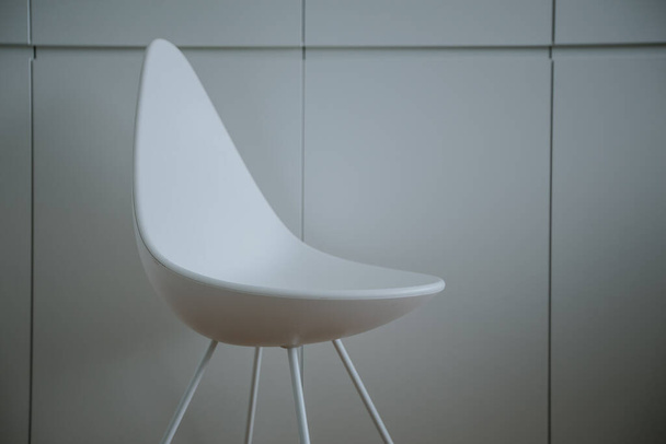 White chair on a simple background. Workspace, office and business concept.  - Foto, immagini