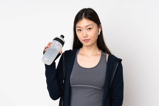 Young Asian Woman With Water Bottle On White Background Stock