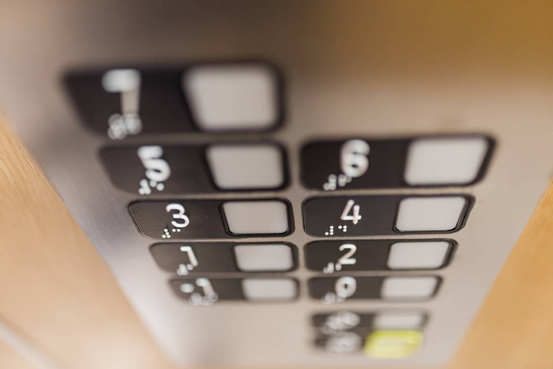 Close up of elevator control panel buttons. - Foto, afbeelding