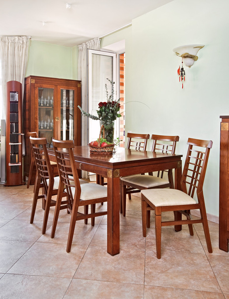 Dining room interior with classic wooden furniture - Фото, изображение