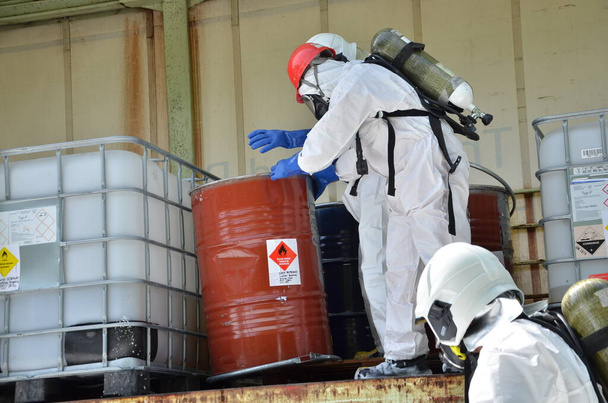 Seremban, Malaysia, 1 February 2015. The special forces Hazmat Fire and Rescue Department of Malaysia, making exercise a chemical spill. - Photo, Image