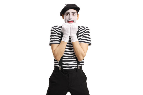 Scared mime gesturing with hands isolated on white background - Foto, Imagen