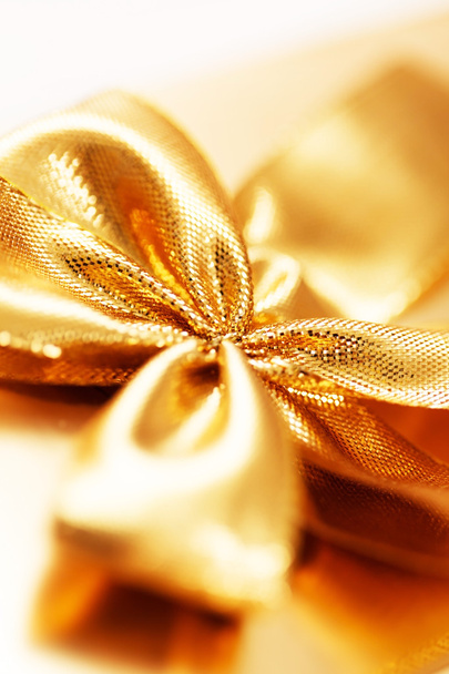 Present with gold bow - Fotó, kép