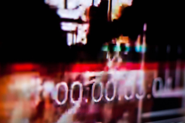 Timecode (time code) on the abstract glitch background. Timer. Glitch art. Digital errors on the screen. Digital artifacts. - Photo, Image