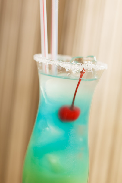 Blue cocktail with cherry - Foto, imagen