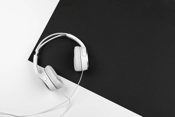 Black and white composition with stylish headphones, flat lay. creative photo. - Foto, imagen