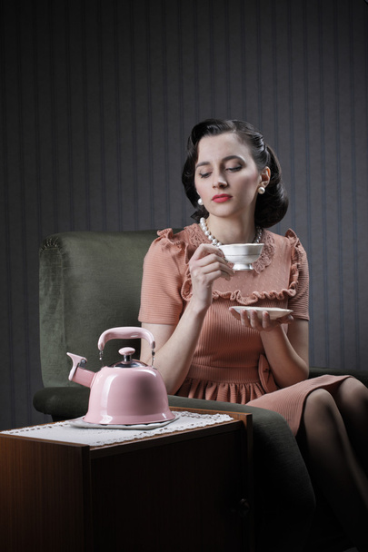 Beautiful woman drinking tea - Photo, image