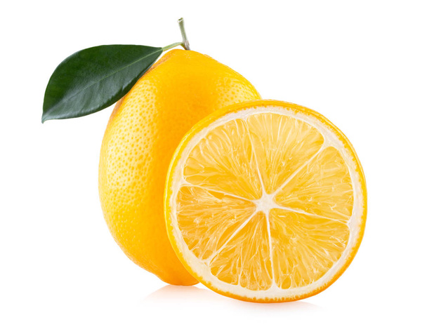 Ripe lemon with leaf and slice isolated on white background - Фото, изображение