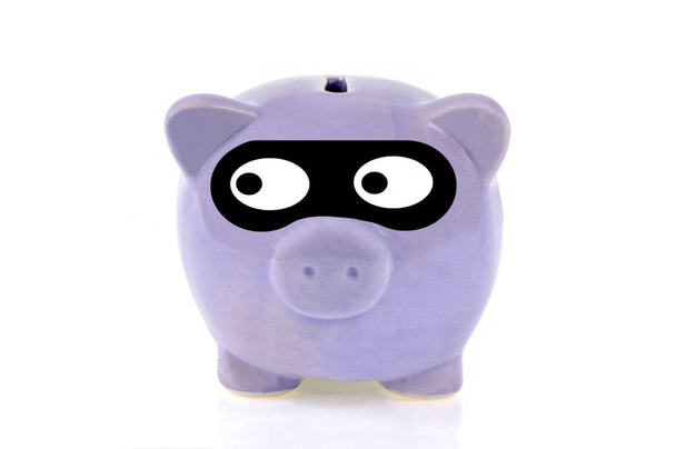 Thief concept with hidden piggy bank close-up on white background  - Photo, Image