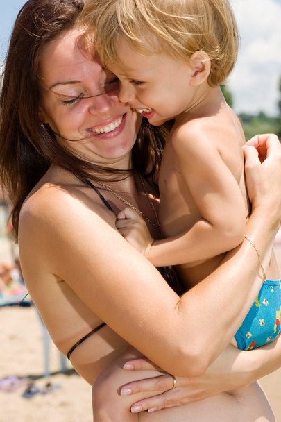 Young mom hugging her little son - Foto, imagen
