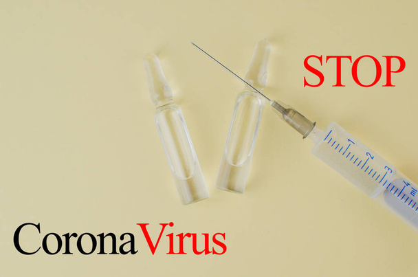 Detener coronavirus 2019. Inyecciones, pastillas para el virus. Copiar espacio para texto
 - Foto, imagen