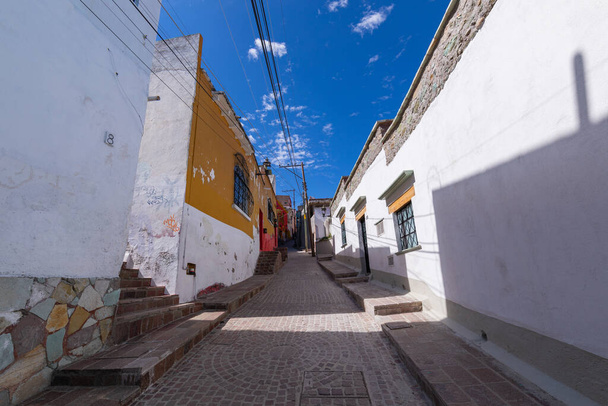 Colored colonial houses in old town of Guanajuato. Colorful alleys and narrow streets in Guanajuato city, Mexico. Spanish Colonial Style. - Photo, Image