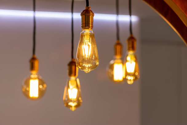 a elegant modern illuminated light bulb in office reception - Photo, Image