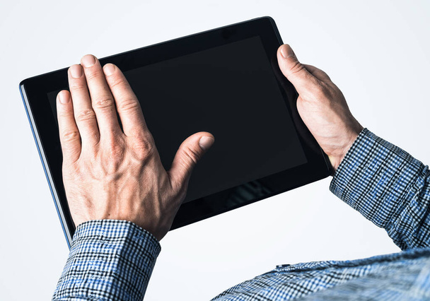 Close up of businessperson using digital tablet with blank display - Valokuva, kuva