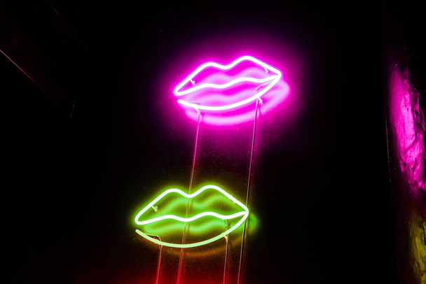 Lip shaped neon signs led glow decorative lights, wall decor  - Photo, Image