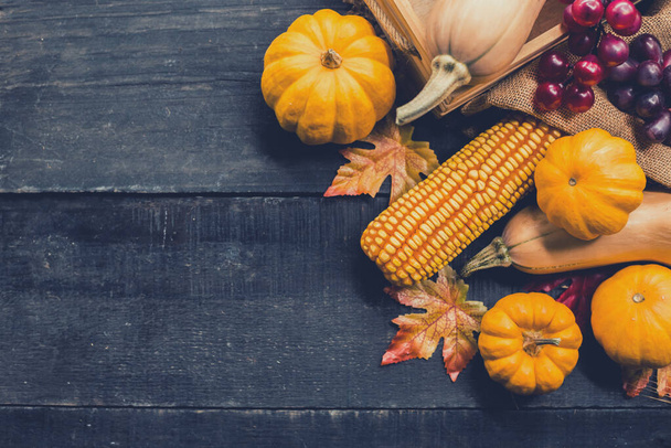 Thanksgiving background with fruit and vegetable on wood in autumn and Fall harvest season.Copy space for text. - Fotó, kép